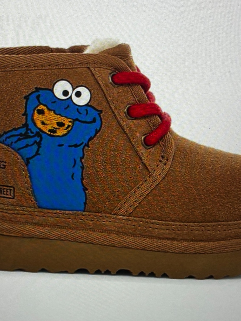 UGG Kids Brown Suede Boots with Red Elmo Patch and Blue Laces